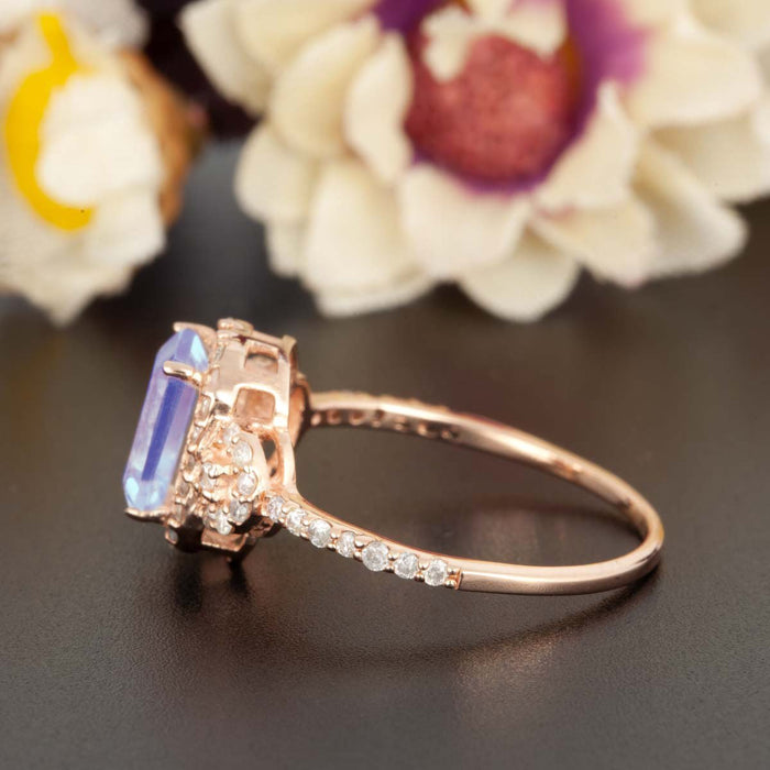 1.25 Carat Emerald Cut Sapphire and Diamond Engagement Ring in Rose Gold Dazzling Ring