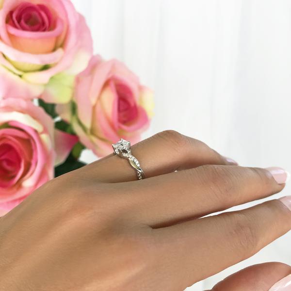 Beautiful 1.25 Carat Princess Cut Twisted Infinity Engagement Ring in White Gold over Sterling Silver