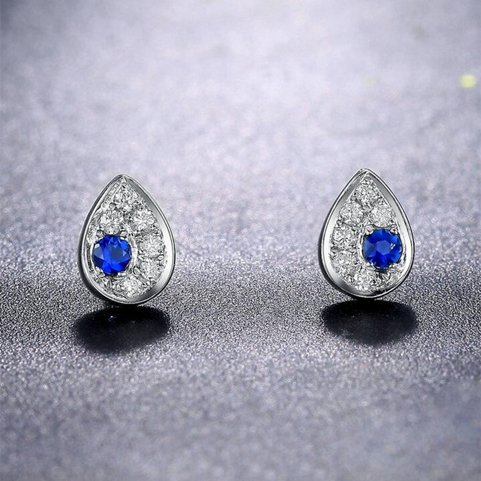 Cluster .50 Carat Round Cut Sapphire and Diamond Stud Earrings in White Gold