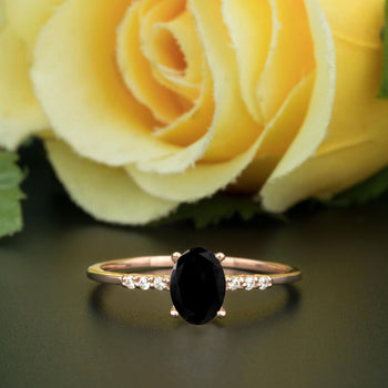 1.25 Carat Oval Cut Black Diamond and Diamond Engagement Ring in Rose Gold Elegant Ring