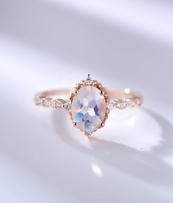 Vintage Inspired 1.25 Carat Oval Cut Rainbow Moonstone and Diamond Engagement Ring in Rose Gold