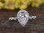 Antique 1.50 Carat Pear Cut Moissanite and Diamond Halo Engagement Ring in White Gold