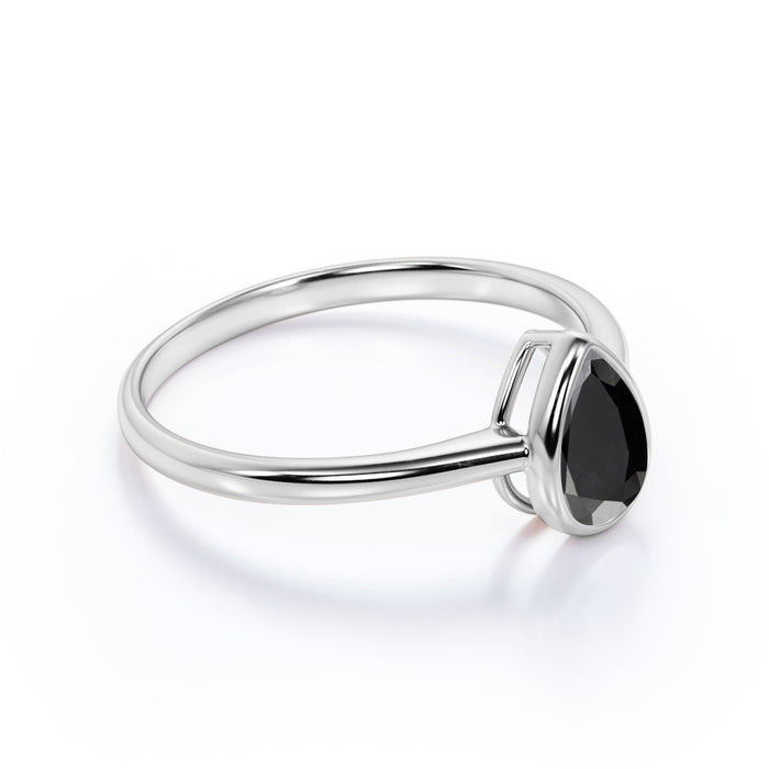 1 Carat Minimalist Bezel Set Pear Shaped Black Diamond Solitaire Engagement Ring in White Gold