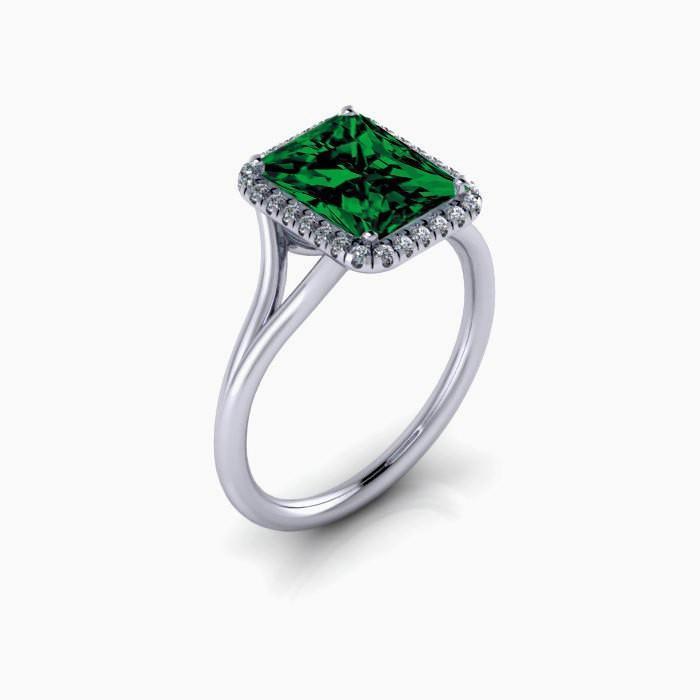 2.00 carat Emerald Cut Emerald and Diamond Halo Bridal Set in 9k White Gold