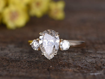 3 Stone Trilogy Pear Cut Moissanite and Diamond 1.25 carat Engagement Ring in White Gold