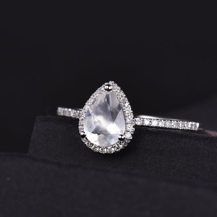 Pave Setting 1.50 Carat Pear Shape Blue Moonstone and Diamond Halo Engagement Ring in White Gold