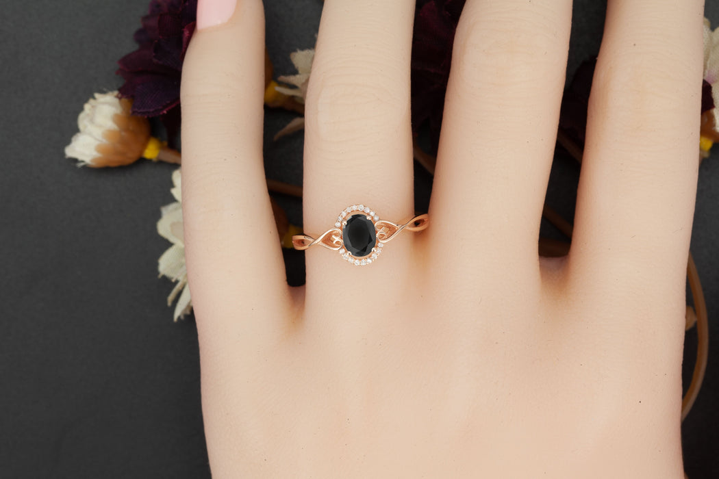 1.25 Carat Oval Cut Black Diamond and Diamond Engagement Ring in Rose Gold for Modern Brides