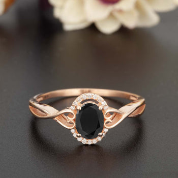 1.25 Carat Oval Cut Black Diamond and Diamond Engagement Ring in Rose Gold for Modern Brides