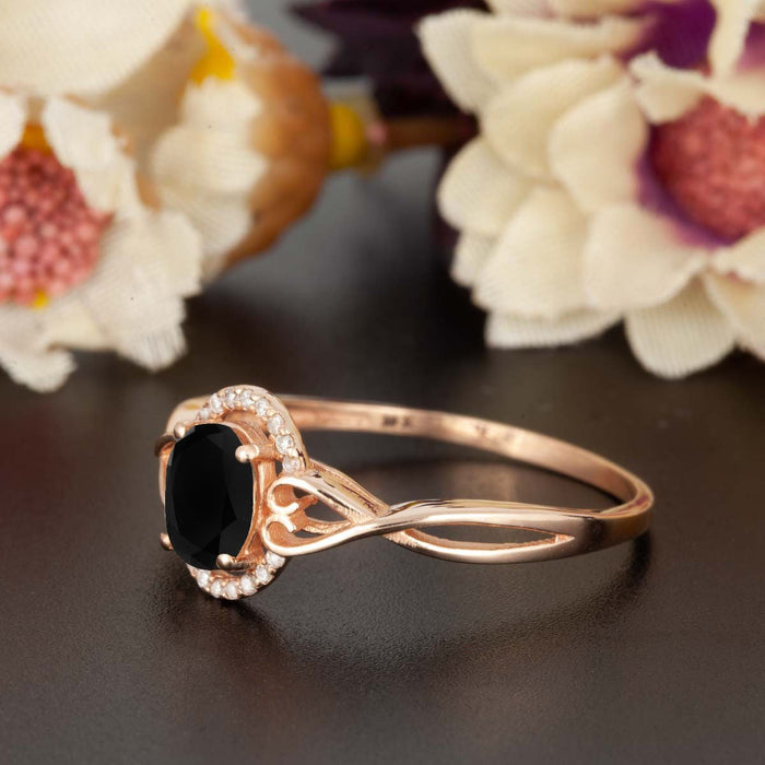 1.25 Carat Oval Cut Black Diamond and Diamond Engagement Ring in Rose Gold for Modern Brides