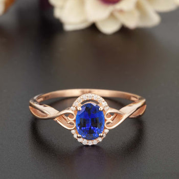 1.25 Carat Oval Cut Sapphire and Diamond Engagement Ring in Rose Gold for Modern Brides