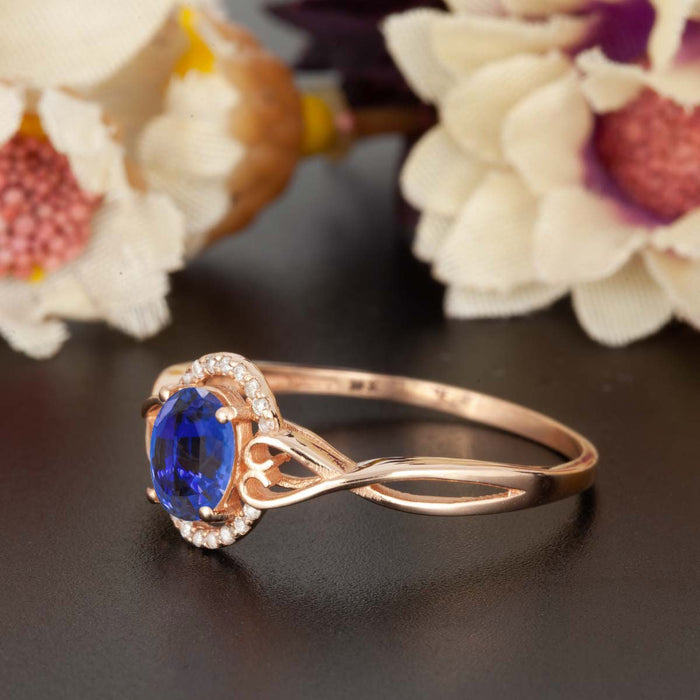 1.25 Carat Oval Cut Sapphire and Diamond Engagement Ring in Rose Gold for Modern Brides