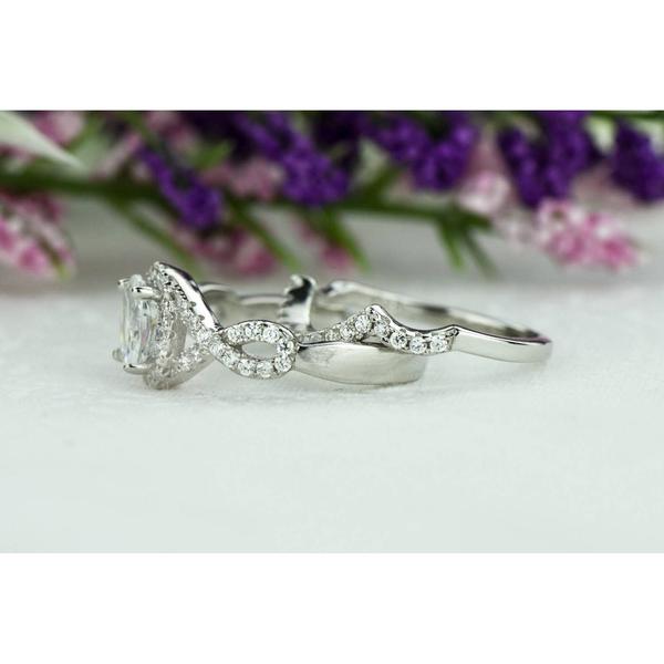 2 Carat Oval Cut Twisted Halo Wedding Ring Set in White Gold over Sterling Silver