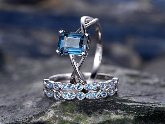 Emerald cut sales trio engagement ring