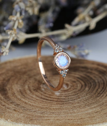 Seven Stone 1.10 Carat Round Cut Rainbow Moonstone and Diamond Bezel Engagement Ring in Rose Gold