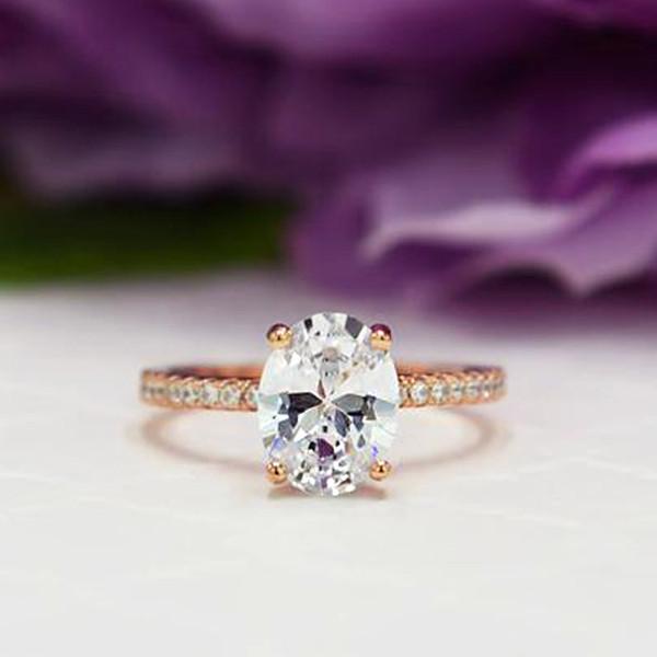 2.25 Carat Oval Cut Accented Engagement Ring in Rose Gold over Sterling Silver
