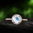 Cluster Pave 1.50 Carat Round Cut Blue Moonstone and Diamond Halo Engagement Ring in Rose Gold