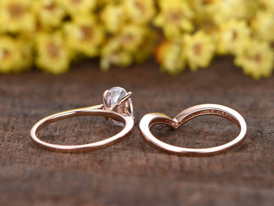 1.25 Carat Oval Cut Moissanite and Diamond Wedding Set in Rose Gold
