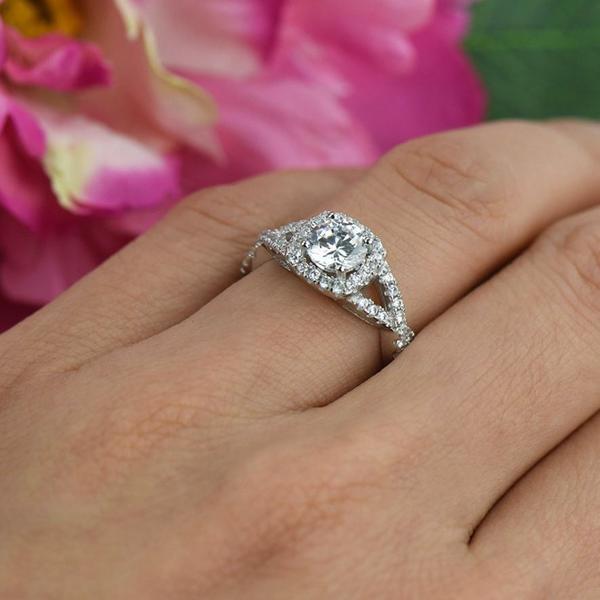 1.5 Carat Round Cut Twisted Halo Engagement Ring in White Gold Over Sterling Silver