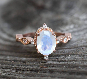 Art Deco 1.25 Carat Oval Cut Rainbow Moonstone and Diamond Vintage Engagement Ring in Rose Gold