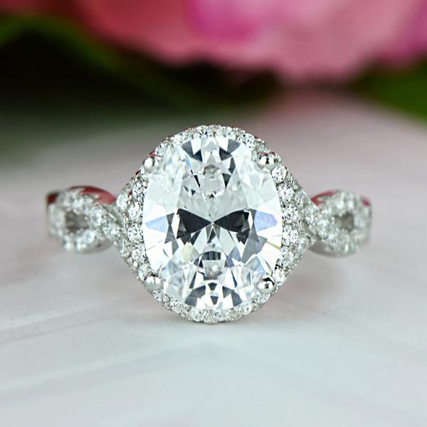 3.5 Carat Oval Cut Twisted Halo Engagement Ring in White Gold over Sterling Silver