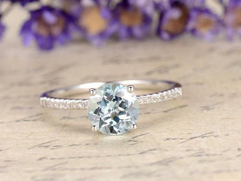 Stunning 1.25 Carat Round cut Aquamarine and Diamond Engagement Ring in Rose Gold
