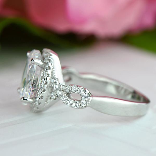 3.5 Carat Oval Cut Twisted Halo Engagement Ring in White Gold over Sterling Silver