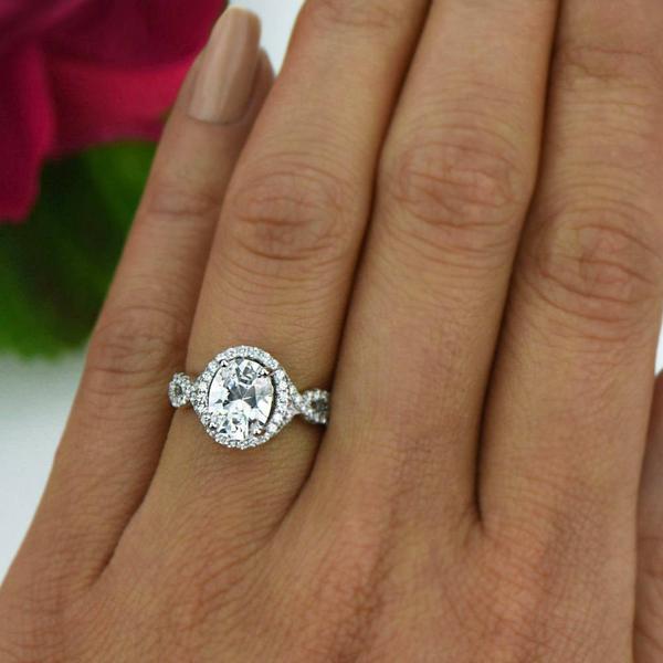 2.5 Carat Oval Twisted Halo Engagement Ring in White Gold over Sterling Silver