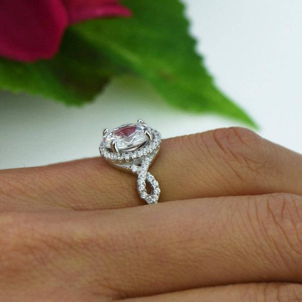 2.5 Carat Oval Twisted Halo Engagement Ring in White Gold over Sterling Silver