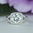 2.25 Carat Round Twisted Round Halo Engagement Ring in White Gold over Sterling Silver