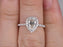 1.5 Carat Pear Cut Moissanite and Diamond Wedding Ring in White Gold