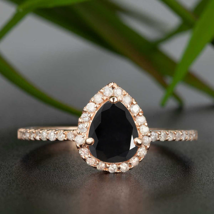 1.25 Carat Pear Cut Black Diamond and Diamond Engagement Ring in Rose Gold for Modern Brides