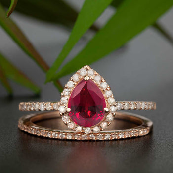 1.5 Carat Pear Cut Ruby and Diamond Wedding Ring Set in 9k Rose Gold for Modern Brides