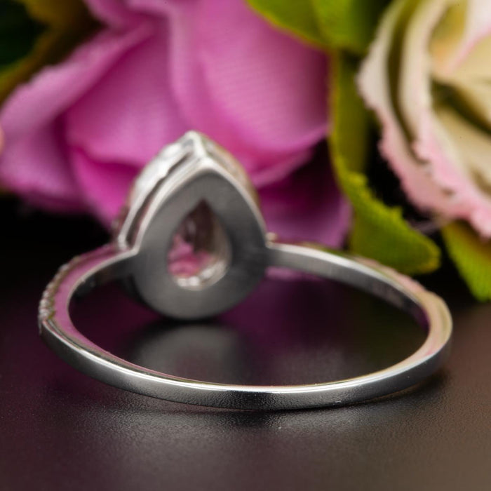 1.25 Carat Pear Cut Black Diamond and Diamond Engagement Ring in White Gold for Modern Brides