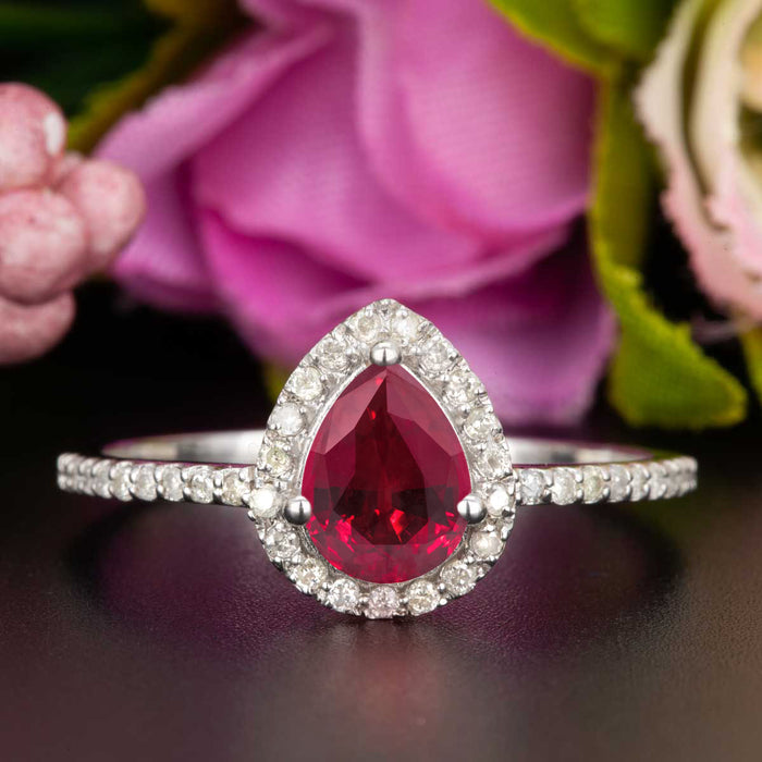 1.25 Carat Pear Cut Ruby and Diamond Engagement Ring in 9k White Gold for Modern Brides