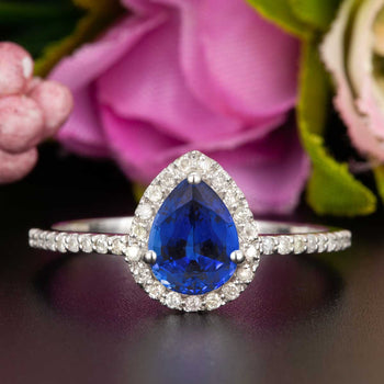 1.25 Carat Pear Cut Sapphire and Diamond Engagement Ring in White Gold for Modern Brides