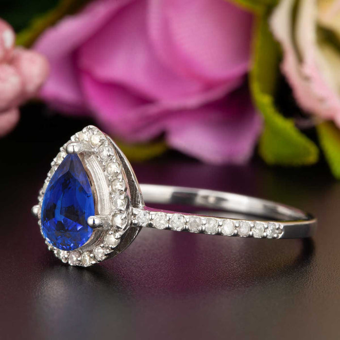 1.25 Carat Pear Cut Sapphire and Diamond Engagement Ring in White Gold for Modern Brides