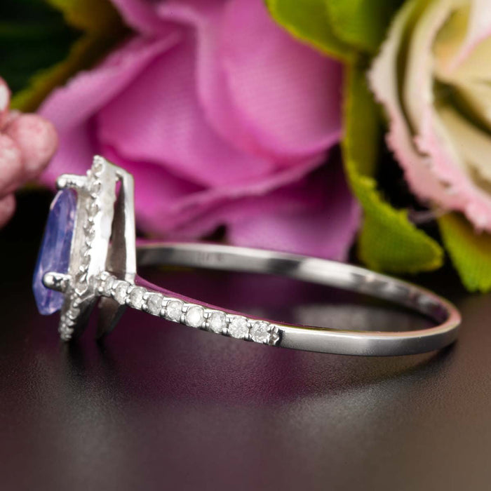 1.25 Carat Pear Cut Sapphire and Diamond Engagement Ring in White Gold for Modern Brides
