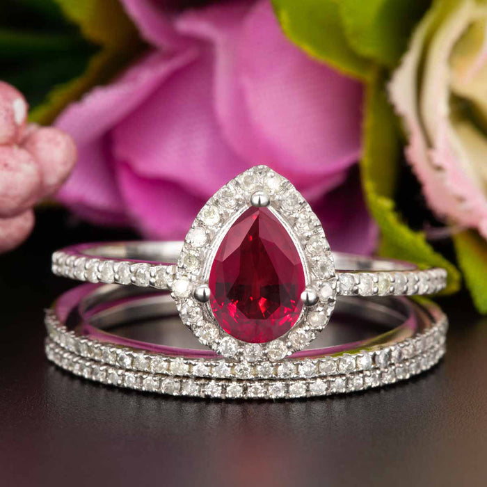 2 Carat Pear Cut Ruby and Diamond Trio Wedding Ring Set in 9k White Gold for Modern Brides