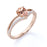 1.5 Carat Pear Shaped Morganite Split-Shank Chevron Engagement Ring with Pave Diamonds in Rose Gold