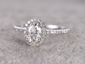 1.50 Carat Oval Cut Moissanite and Diamond Halo Engagement Ring in 9k White Gold