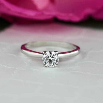 0.5 Carat Round Cut Solitaire Engagement Ring in White Gold over Sterling Silver