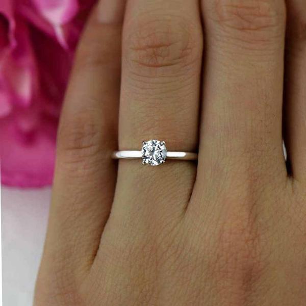 0.5 Carat Round Cut Solitaire Engagement Ring in White Gold over Sterling Silver