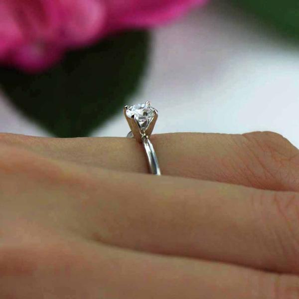 0.5 Carat Round Cut Solitaire Engagement Ring in White Gold over Sterling Silver