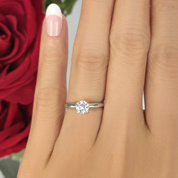 Classic 0.5 Carat Round Cut Solitaire Engagement Ring in White Gold over Sterling Silver