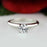 Classic 0.5 Carat Round Cut Solitaire Engagement Ring in White Gold over Sterling Silver