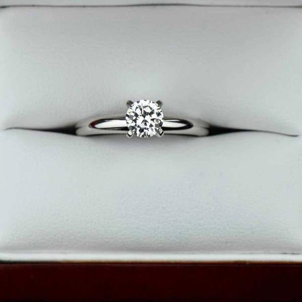 Classic 0.5 Carat Round Cut Solitaire Engagement Ring in White Gold over Sterling Silver