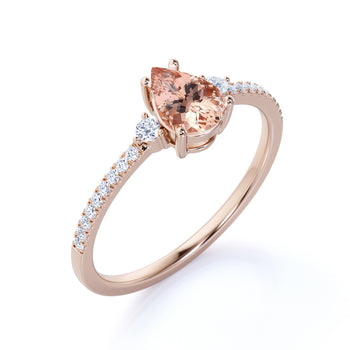 1.5 Carat Three Stone Peach Morganite and Pave Diamond Accents Engagement Ring in Rose Gold