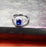 2 Carat Emerald Cut Sapphire and Diamond Halo Engagement Ring