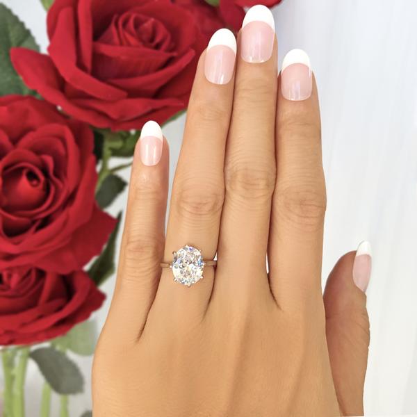 4 Carat Oval Cut Solitaire Engagement Ring in White Gold over Sterling Silver