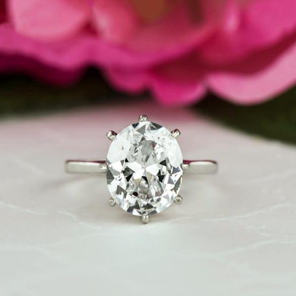 4 Carat Oval Cut Solitaire Engagement Ring in White Gold over Sterling Silver
